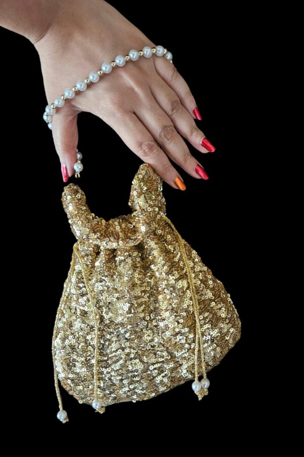 Antique gold potli bag